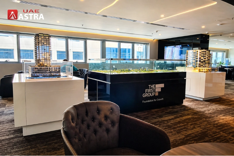 Modern office interior with workspace layout and building models in a Dubai commercial office environment