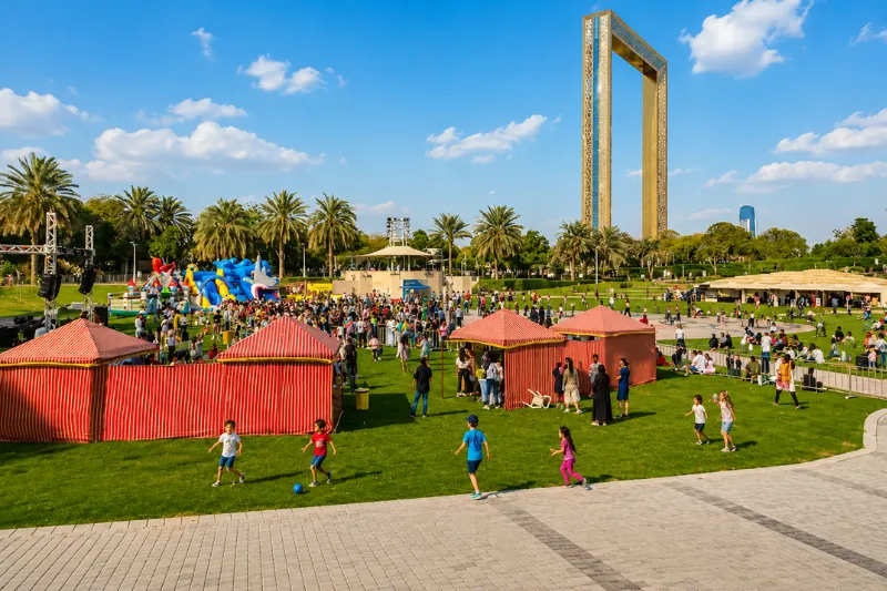Crowds enjoying outdoor activities at Zabeel Park Dubai