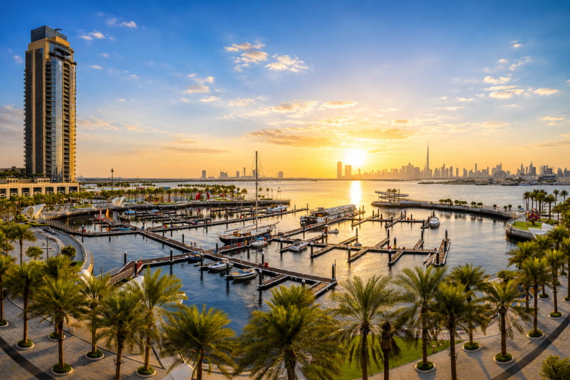 Dubai Creek Harbour marina skyline view at sunset in Dubai