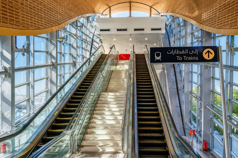 Escalators and train access inside Dubai Metro station