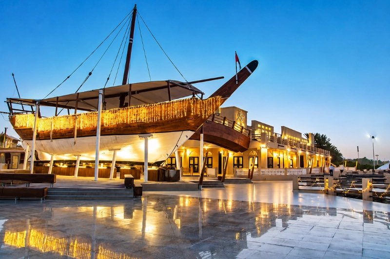 Traditional dhow at Al Boom Tourist Village Dubai at Evening
