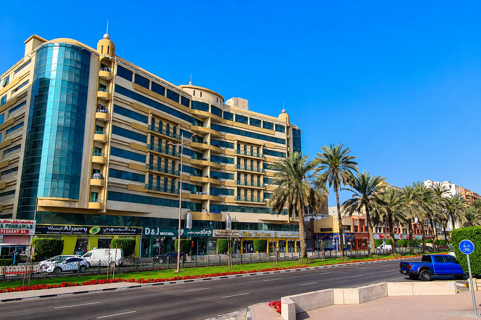 Al Muraqqabat Dubai roadside apartments and retail shops