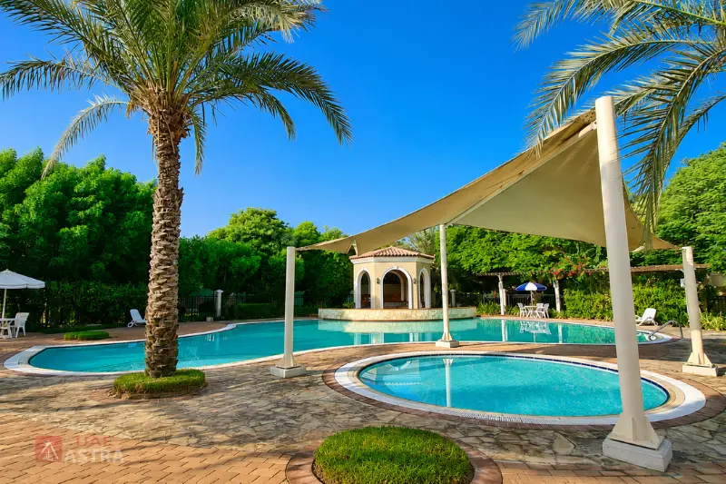 Community swimming pool and leisure area in Green Community West Dubai