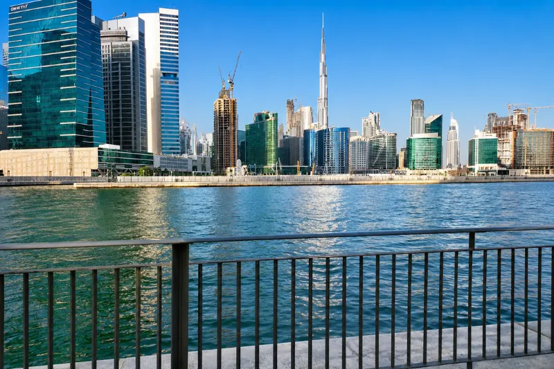 Dubai Canal waterfront view near Bayswater Tower Business Bay with Dubai skyline in the background