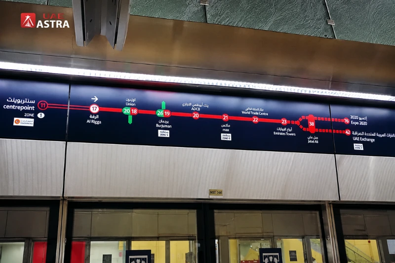 Dubai Metro Red Line route map inside Al Rigga Metro Station showing nearby stations and travel connections