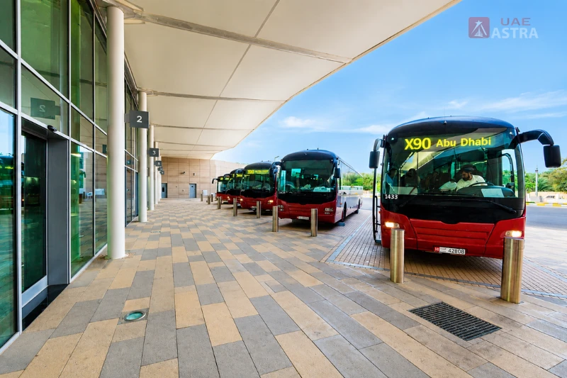 Intercity buses waiting at Al Ain Bus Station for Abu Dhabi and regional routes