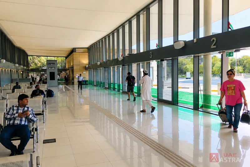 Passenger waiting hall inside Al Ain Bus Station with seating and boarding area