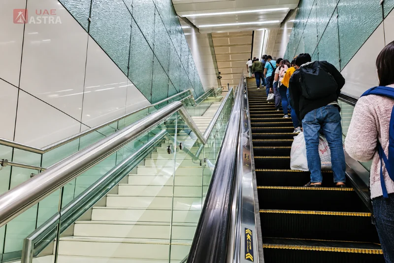 Salah Al Din Metro StEscalator and staircase connecting the concourse and platform at Salah Al Din Metro Stationation