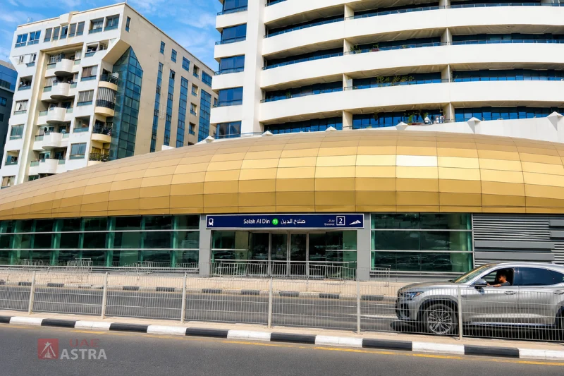 Salah Al Din Metro Station 2 entrance with roadside access and surrounding buildings in Deira, Dubai