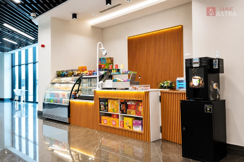 Snack and coffee kiosk inside Fujairah Bus Station offering refreshments for intercity bus passengers