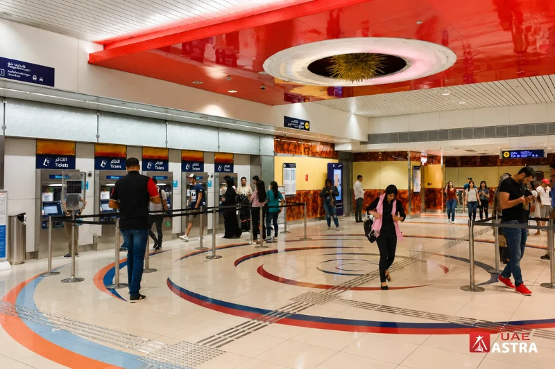 Ticket vending machines and passenger concourse inside Al Rigga Metro Station in Deira, Dubai