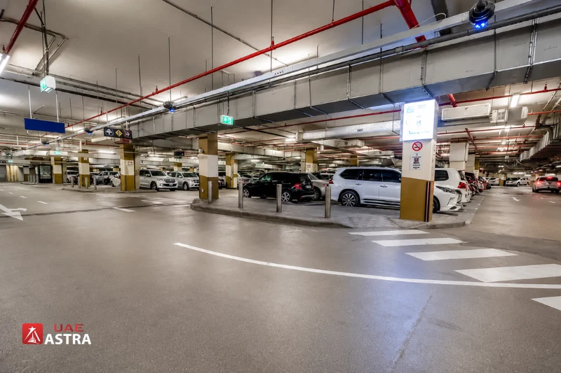 Underground parking area at Souk Al Bahar with spacious parking bays and clear directional signage