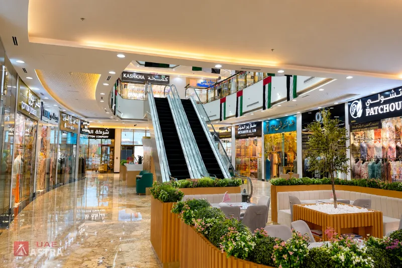 Abaya Mall Dubai interior with shops and escalators