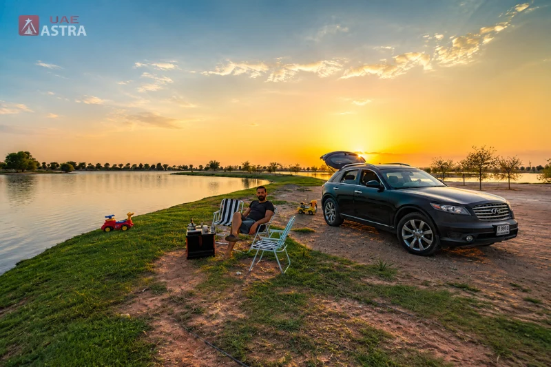 Al Qudra Lake picnic by the water at sunset