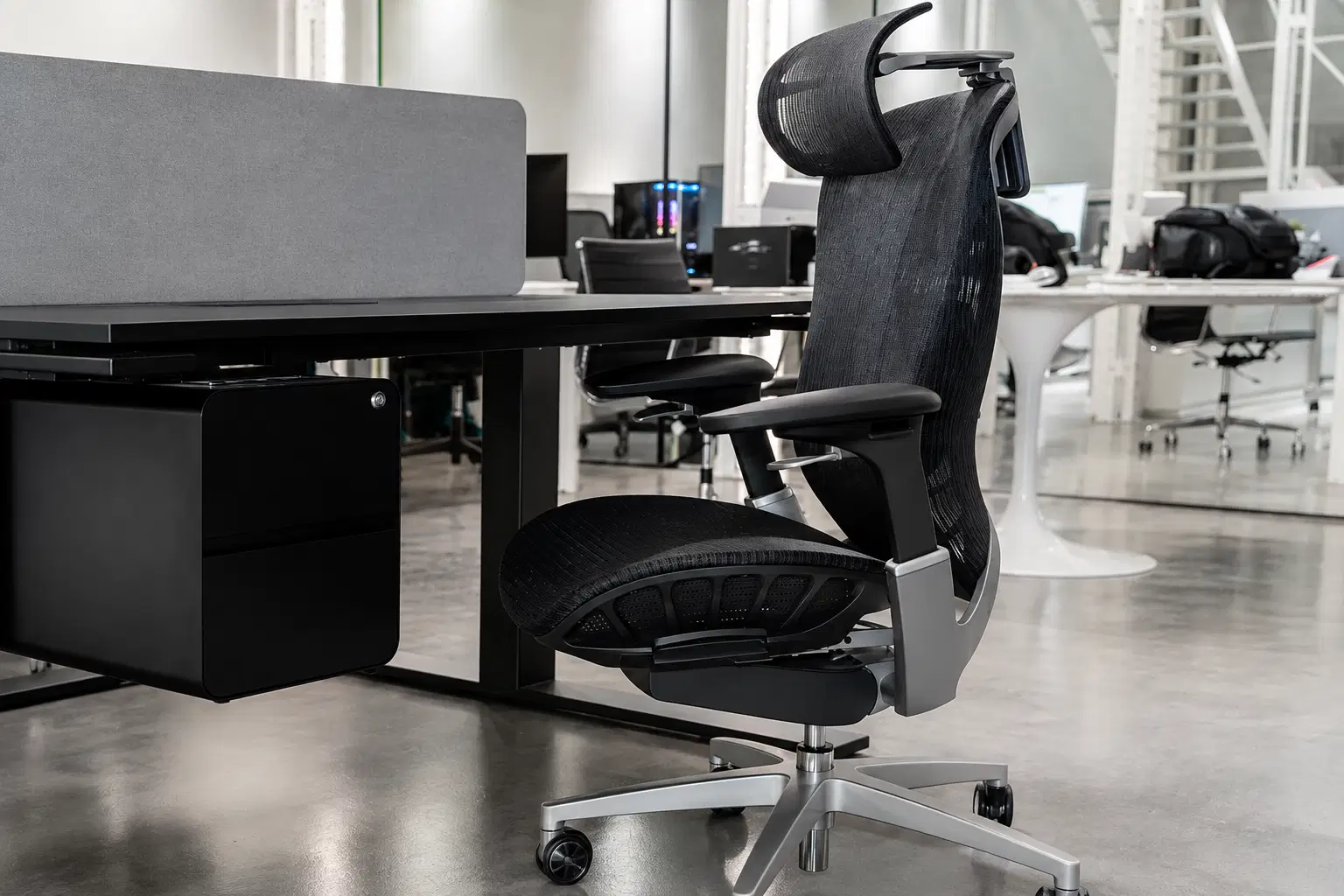 Ergonomic office chair at a modern workstation