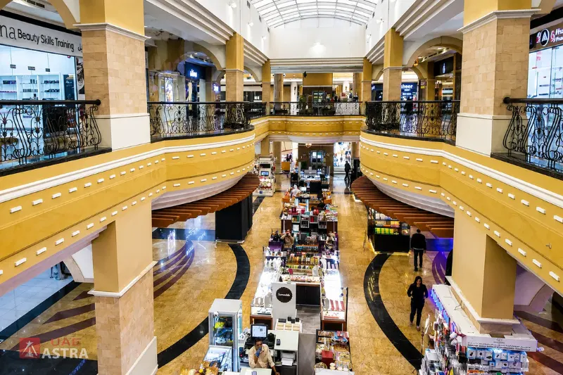 Etihad Mall Dubai interior with shops and central atrium