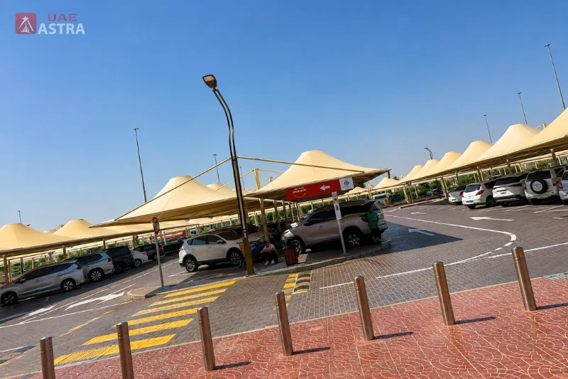 Etihad Mall Dubai parking area with covered spaces and pickup zone