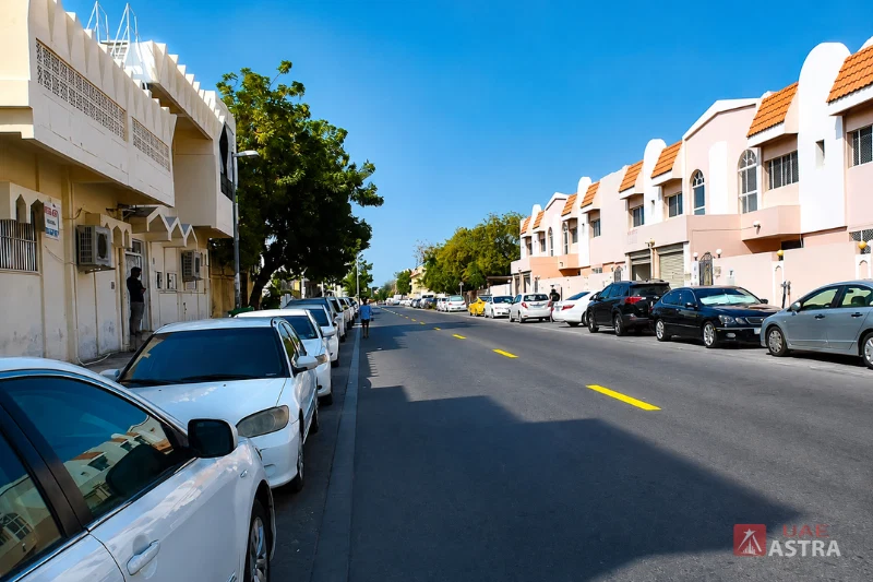 Hor Al Anz Dubai residential street with villas and parked cars