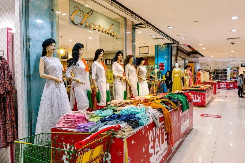 Madinat Zayed Shopping Centre fashion store and clothing displays