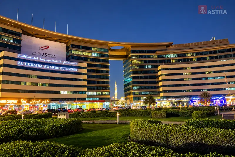 Al Hudaiba Awards Building illuminated at night in Dubai