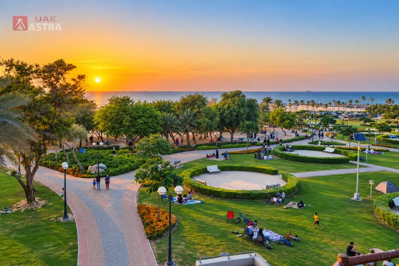 Al Mamzar Beach Park family recreation area at sunset