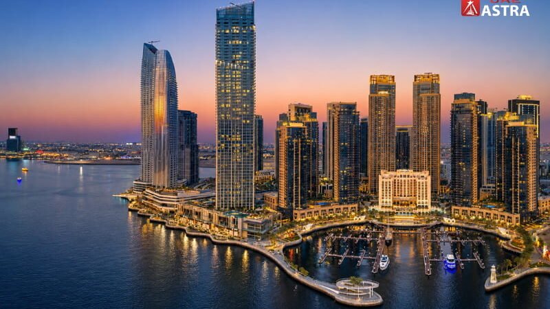 Dubai Creek Harbour waterfront skyline at sunset in Dubai
