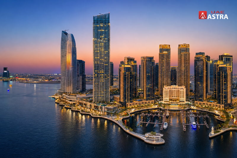 Dubai Creek Harbour waterfront skyline at sunset in Dubai