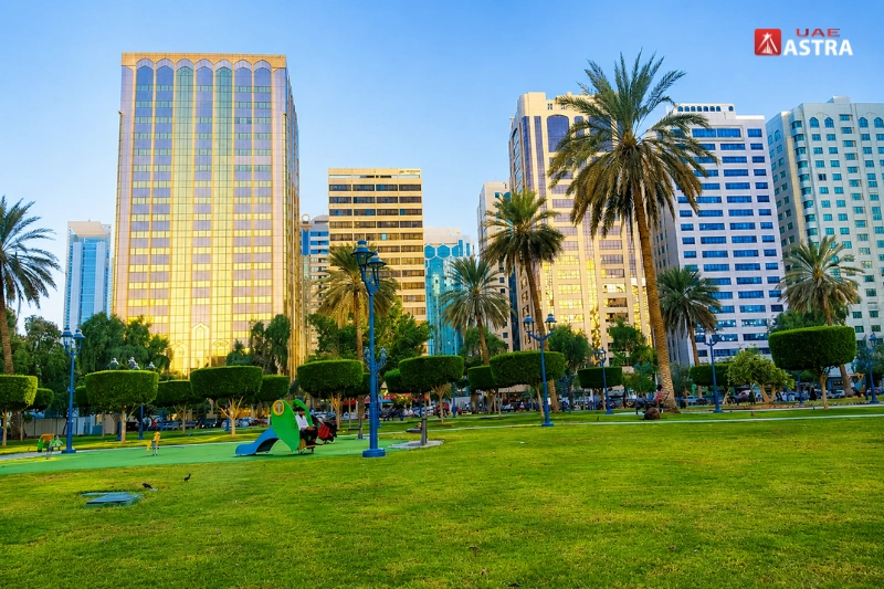 Electra Park Abu Dhabi with green lawns and city skyline