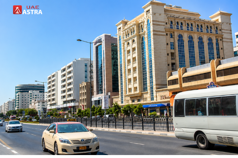 Al Muraqqabat Dubai main road with hotels and commercial buildings