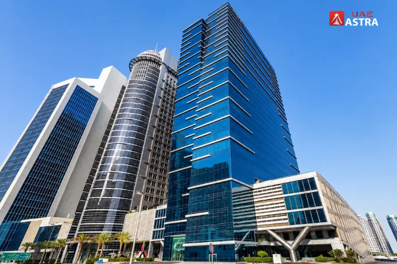 Side view of Bayswater Tower Business Bay showcasing its modern glass façade and commercial office architecture