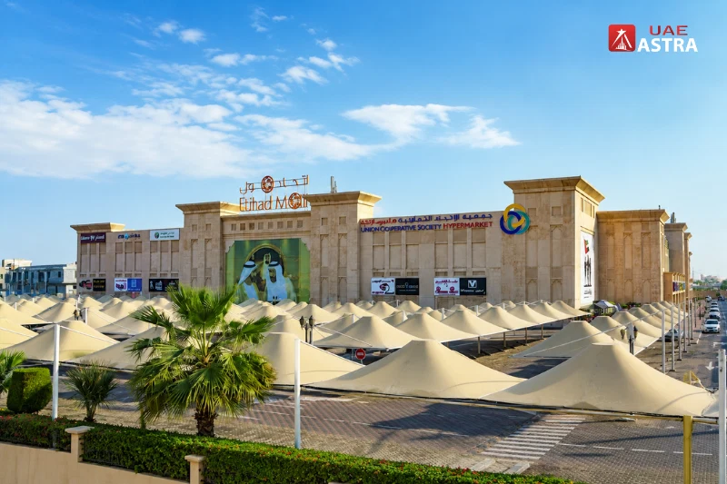 Etihad Mall Dubai exterior with Union Coop hypermarket and parking area