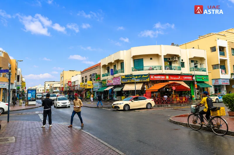 Hor Al Anz Dubai street with local shops and restaurants