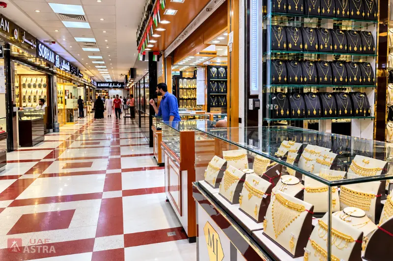 Ajman Gold Souq jewellery shops displaying gold necklaces and traditional jewellery sets