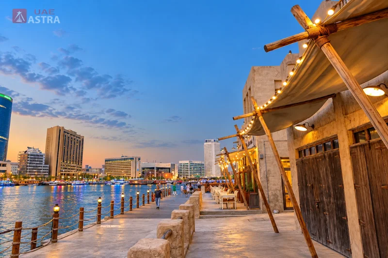 Al Seef waterfront promenade with creek views, traditional architecture and outdoor dining