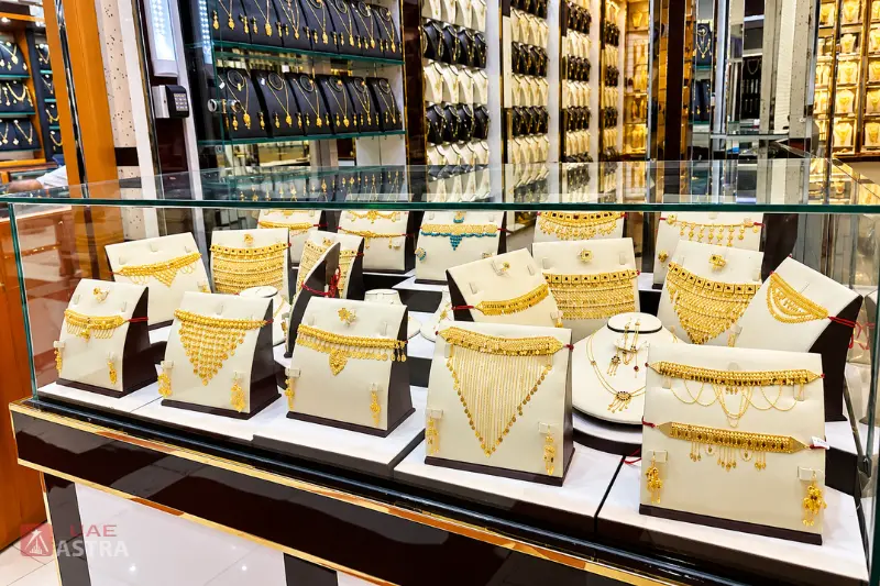 Gold jewellery sets and traditional bridal necklaces displayed at Ajman Gold Souq