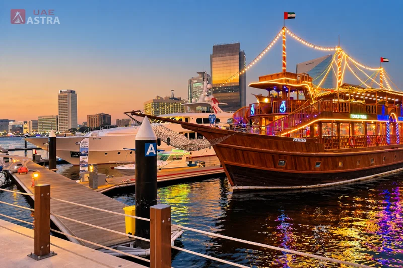 Traditional dhow cruise boat and marina at Dubai Creek, Al Seef waterfront