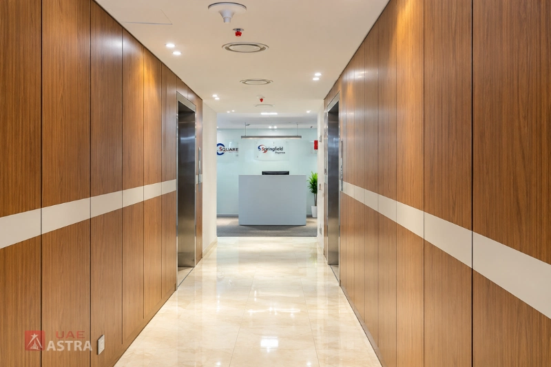 Donna Towers office corridor with reception area and elevators