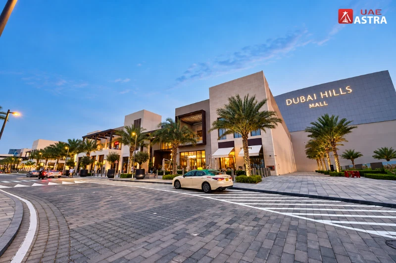 Dubai Hills Mall exterior and main entrance at dusk, Dubai