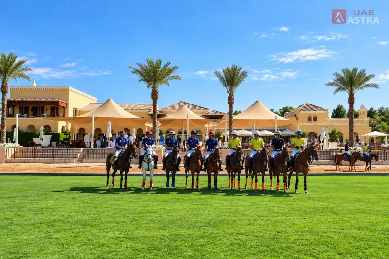 Dubai Polo and Equestrian Club with polo players on horseback in a green field